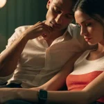 Couple Sitting Close Together on the Sofa