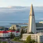 Realistic view of Reykjavík with signs of legal cannabis sales, representing cannabis legal status in Iceland.