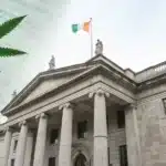 Realistic image of an Irish courthouse with cannabis legal documents, illustrating Ireland weed laws in action.