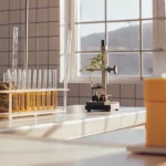 cannabis laboratory with test tubes and microscope under natural light