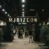 Entrance of MJBizCon Las Vegas with attendees walking into the cannabis industry expo, surrounded by decorative plants.