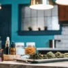 A rustic kitchen scene featuring homemade cannabis infusions, dried herbs, and preserved ingredients, showcasing small-batch preparation and artisanal cannabis processing.