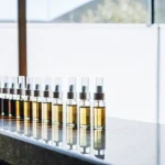 Cannabis extract dropper bottles arranged in a row for quality testing