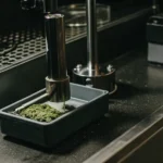 Laboratory device compressing and testing a cannabis sample in a modern analytical environment.