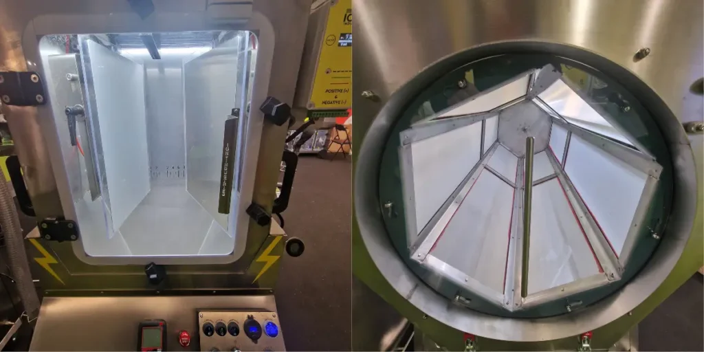 Industrial cannabis processing chamber with sealed door and internal structure.