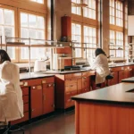 Scientists working in laboratory environment conducting cannabis research and analysis.