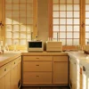Modern laboratory with glassware, analytical equipment and organized workstations.
