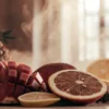 Tropical fruits and cannabis buds arranged together to represent citrus terpene-rich cannabis aromas.