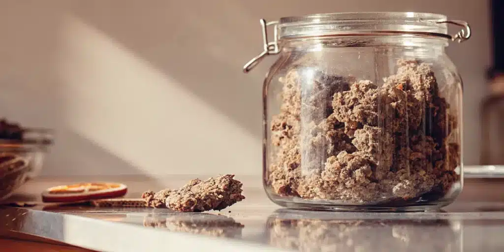 Cured Cannabis Buds Stored in a Glass Jar