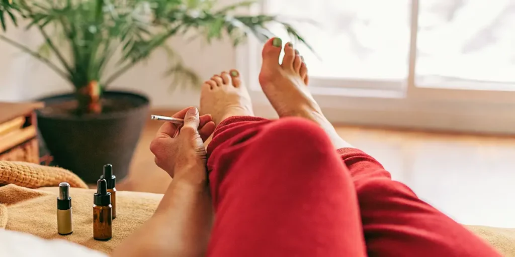 Adult Using a Cannabis Vape at Home